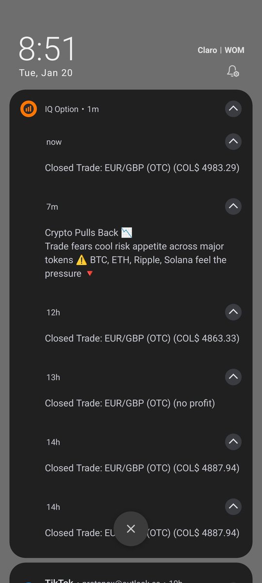 Pantalla de bloqueo con notificaciones de trades cerrados en IQ Option